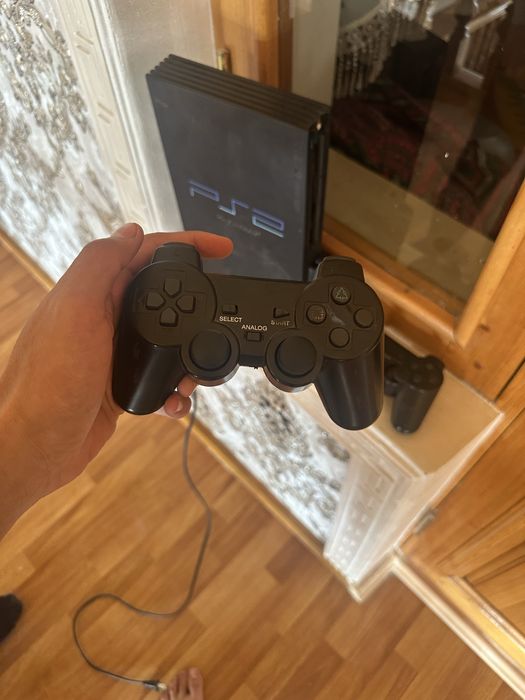Playstation2 holati yaxshi ichida uyini yoq