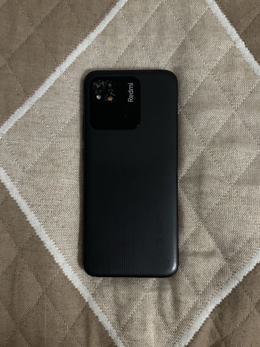 Redmi телефон.