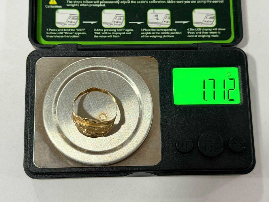 Златен дамски пръстен с диамантени нарези 1.7гр