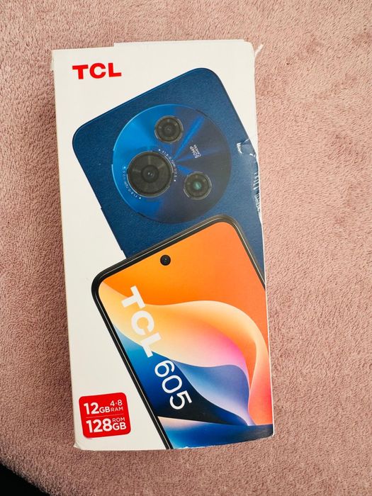Телефон TCL 605.