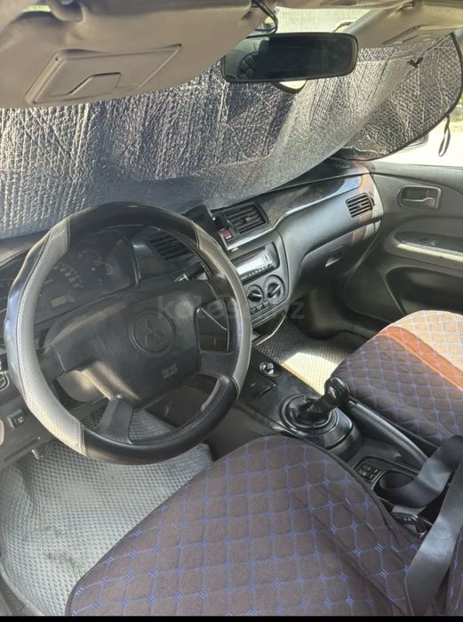 Машина Mitsubishi Lancer