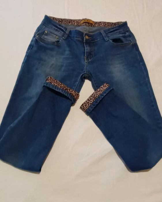 Blugi elastici sckiny sigaretta cu insertii leopard 44-46