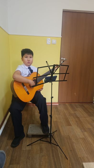 Обучение игре на гитаре