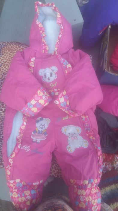 Зимние комбинезоны