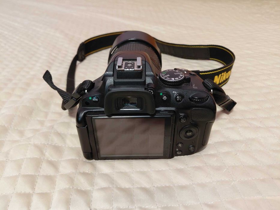 Nikon D5100 + Nikkor 18-55mm