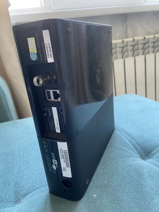 Xbox 360e,больше 75игр