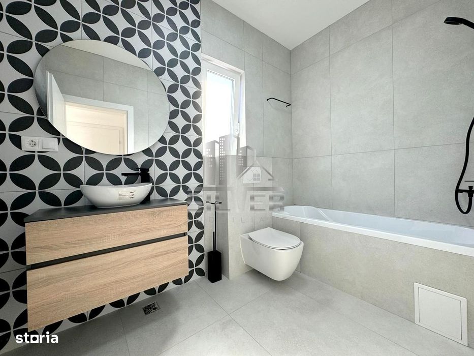 Casa tip duplex  la cheie.
