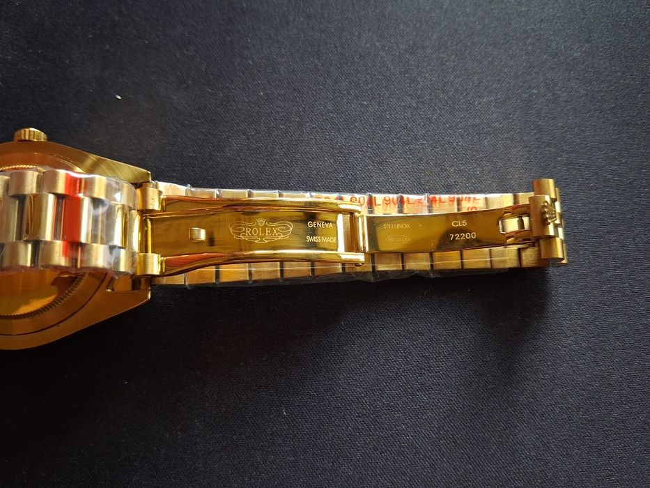 Rolex  Submariner, Day-Date Gold