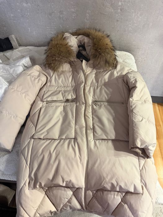 Продам одежду куртки пуховик и т.д