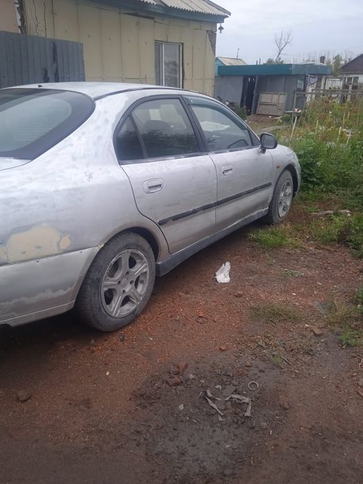 Мицубиси каризма