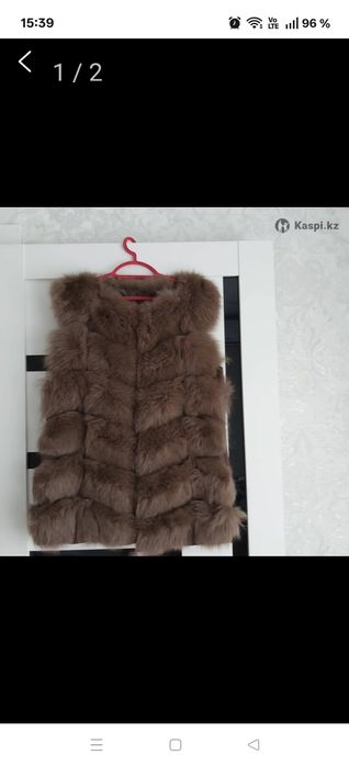 Безрукавки жилет