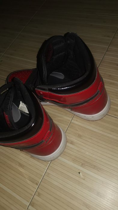 Jordan 1 Bred schimb