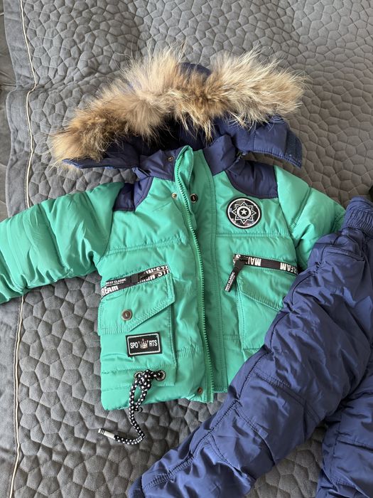 Продам новый зимний комбинезон