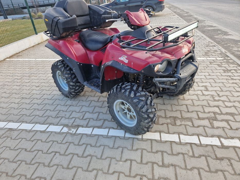 Vând sau schimb ATV Kawasaki