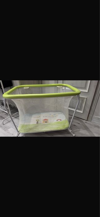 Детский манеж зеленого цвета