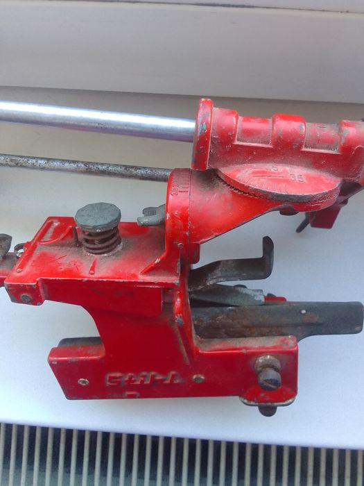 Dispozitiv ascuțit lanț