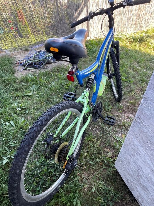 Bicicleta montbike dual suspensie ca si noua
