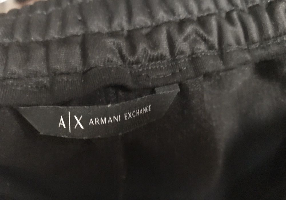 Pantaloni sport, cu capse