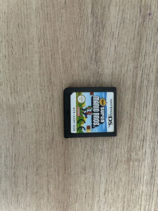 Nintendo dsi (modat) cu 2 jocuri si o carcasa
