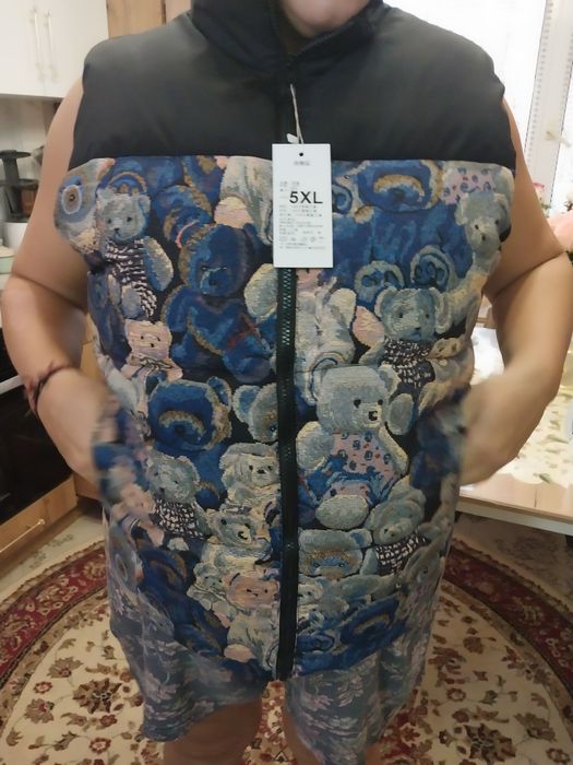 Теплая безрукавка желетка