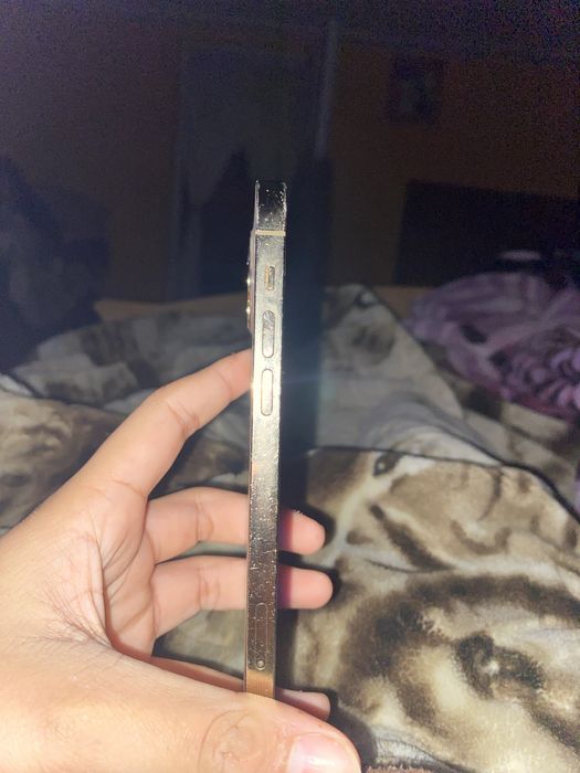 Iphone 12 pro de vanzare cu icloud mai mult va uitati pe poze