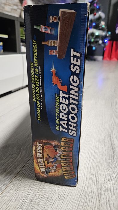 Детска игра със стрелба по бутилки