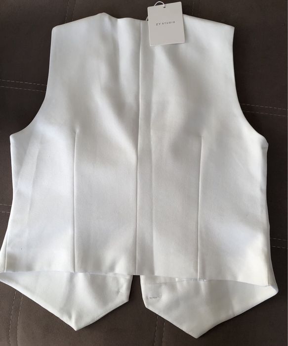 Женская жилетка.