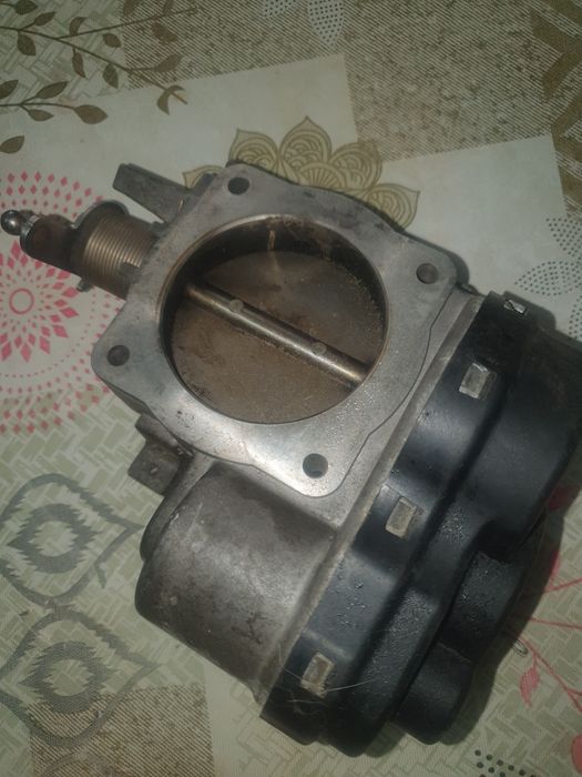 Продам дросельную заслонку