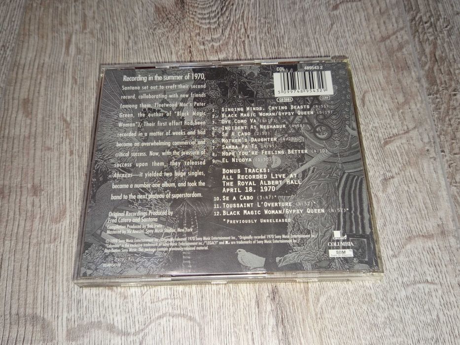 Компакт дискове Santana, Talking Heads, Billy Joel