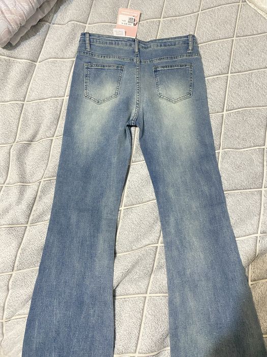 Новые джинсы клеш