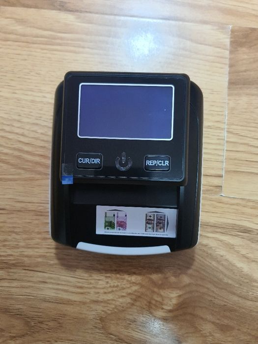 Детектор за проверка на пари евро  долар и паунд.