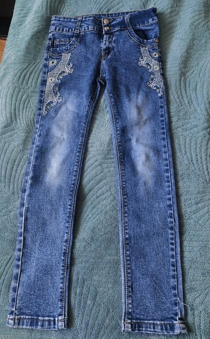 Джинсы для девочки 8-9 лет