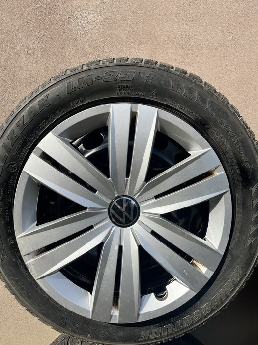 Set 4 jante tablă VW Golf 5 R16 + anvelope 205/55 R16 + 2 seturi capace VW
