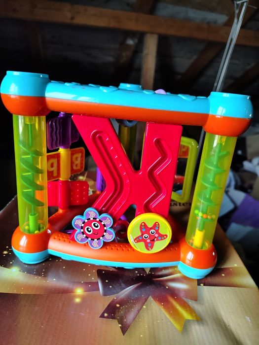 Jucarie bebelusi Minibo, Triunghi cu activitati