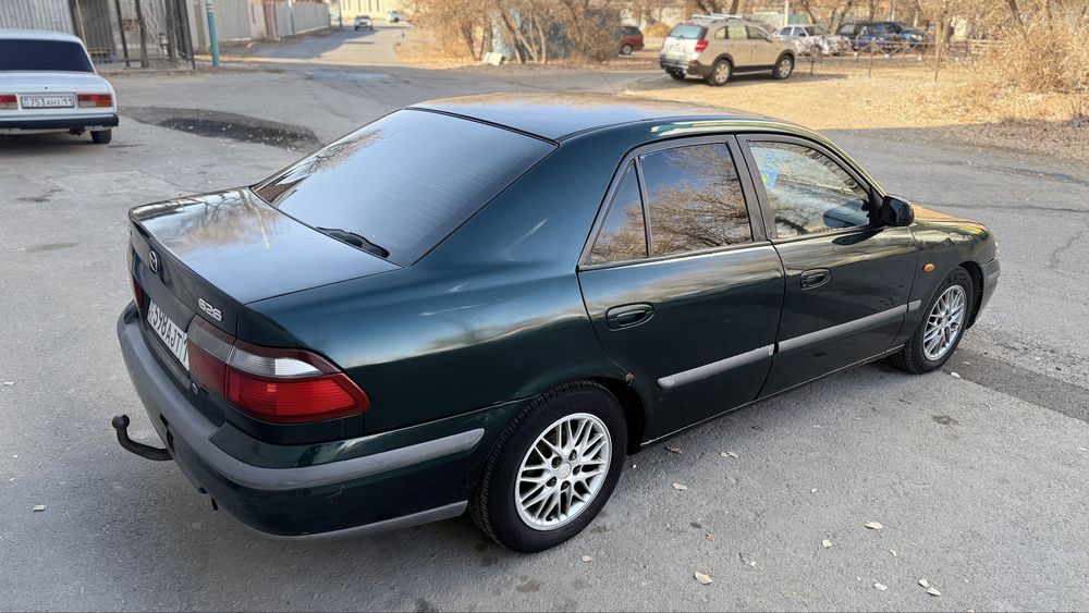 Мазда 626 птичка