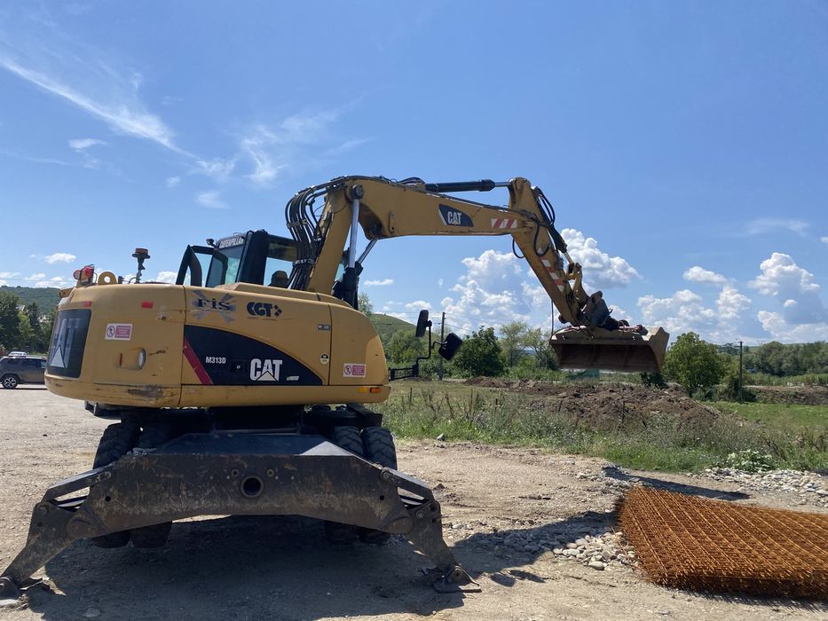 Excavator pneuri Cat 313 D