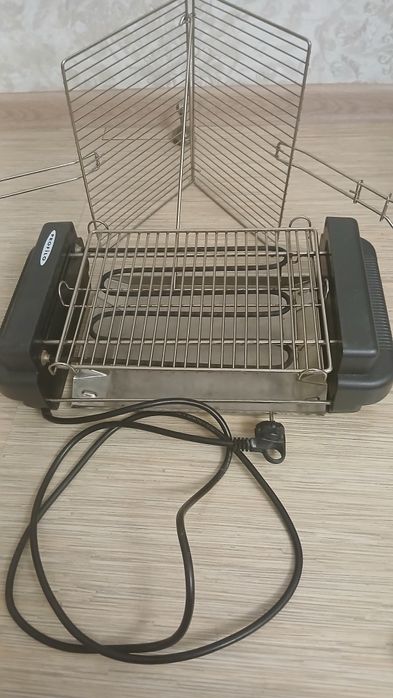 Электрогриль . Почти новый