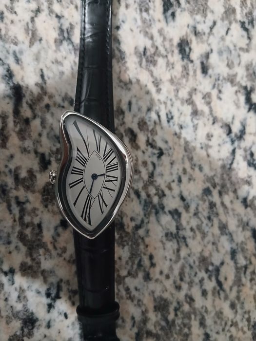 Ceas asimetric old money