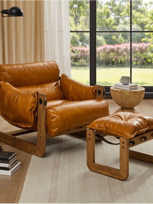 Kreslo yumshoq va oyoq quygich