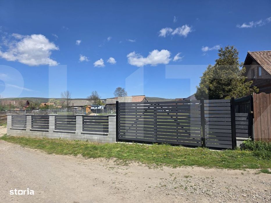 Teren intravilan imprejmuit la Ghidfalau