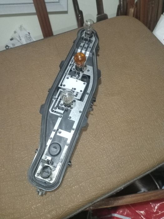 Държач платка за крушки на стоп за Дачия лоджи - десен.