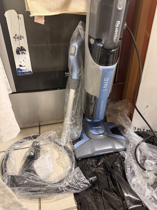 Mop cu aburi cu functie de aspirare si aparat de curatat cu aburi