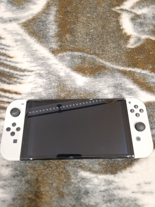 КАТО НОВА! Nintendo Switch OLED + ГАРАНЦИЯ + Кейс и holder за игри