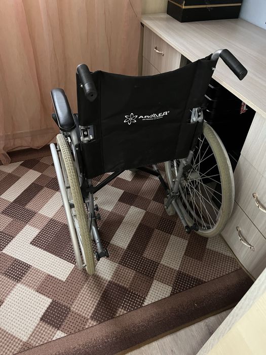 Инвалидное кресло