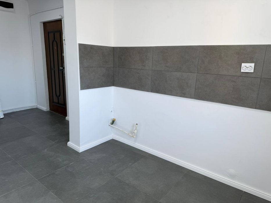 2 camere, Bd.DACIA, stradal,deasupra la notariat,schimb cu garsonieră