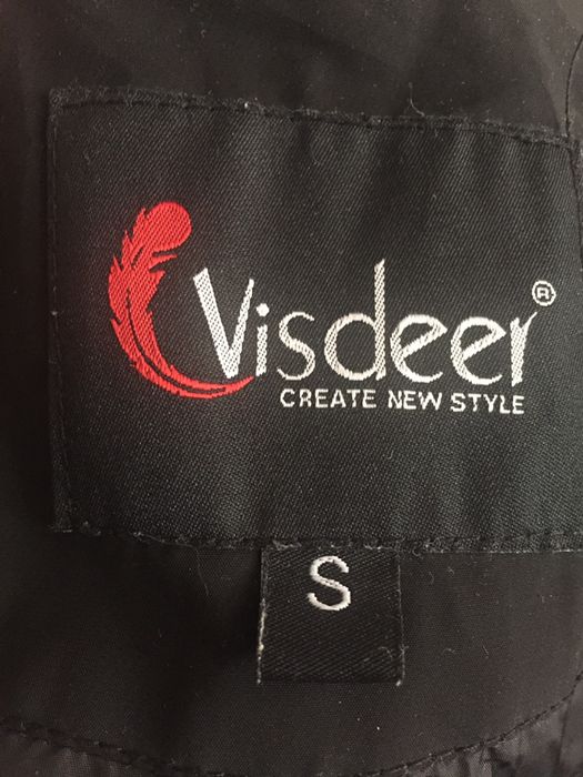 Продам женский пуховик