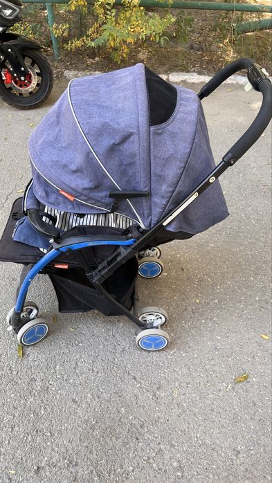 Продам прогулочную коляску Skilmax