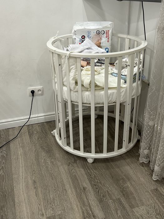 Манеж на колесиках