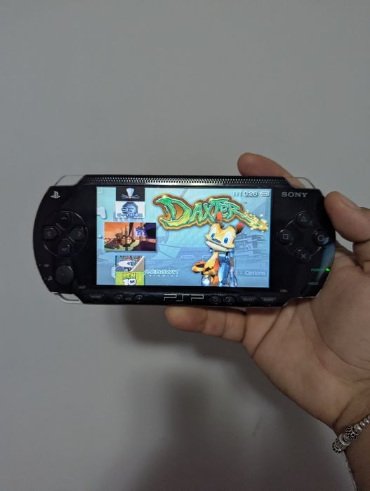 Psp complet cu jocuri 64gb card