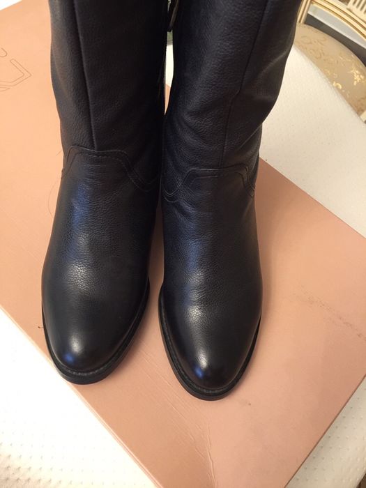 Продам новые сапоги